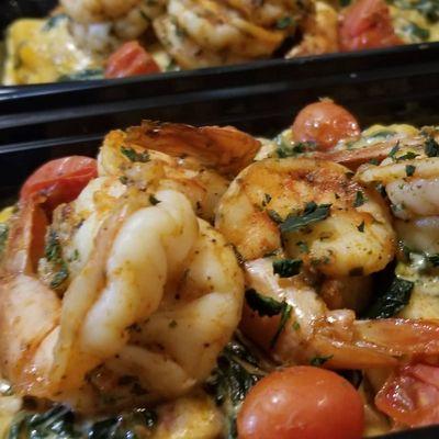 Seafood Ravioli in creamy spinach sauce with Cajun Shrimp