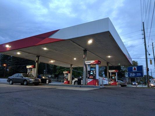 Outside. View of filling station. 8 gas pumps.