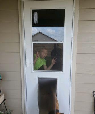 Had them install a storm/doggie door. Dogs love it.