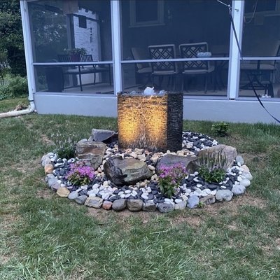 A stacked slate fountain we did last summer. Great addiction to the backyard!