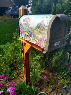 My mailbox; has the number on the side and front.  I might add, it sits right beside my driveway.