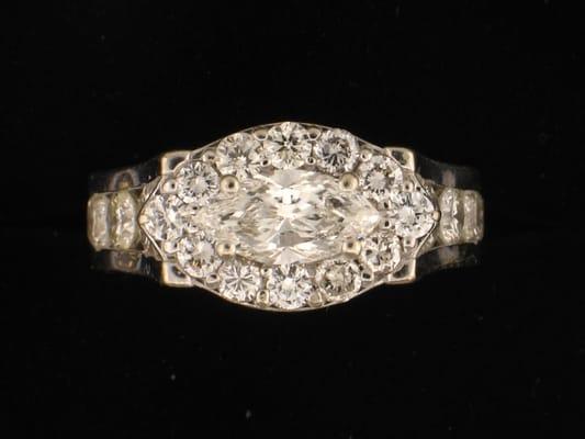 Custom designed an d manufactured ring using the customers diamonds