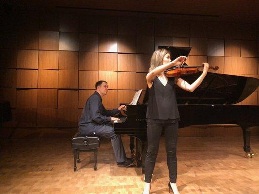 Student - Emma F. performing along side our instructor, Jakub Polaczyk, at Steinway Hall