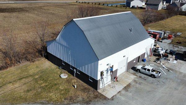 Exterior barn painting and siding.