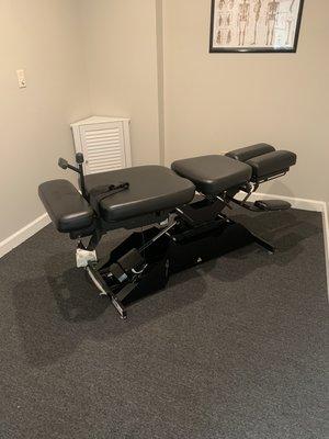 Flexion distraction table