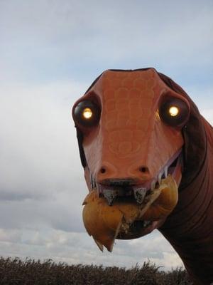 Mechanical pumpkin eating dinosaur