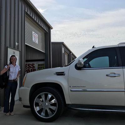 Tara all smiles after getting her hail-free Escalade back