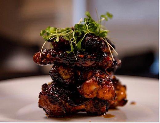 Our char-grilled thai wings are a Pub Favorite!