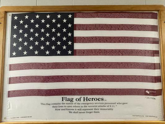 Flag of Heroes hanging on the wall honoring firefighters lost on 0/11