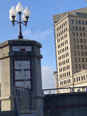 Bridge post with downtown Providence in the background.