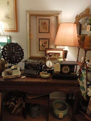 Antique typewriter and scale added to contemporary decor.