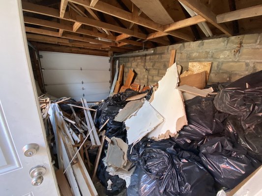 Before: Construction waste from renovation to be hauled away.