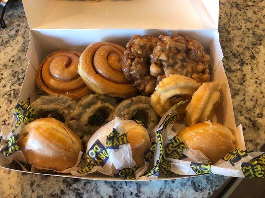 Variety of fresh donuts and fritters.