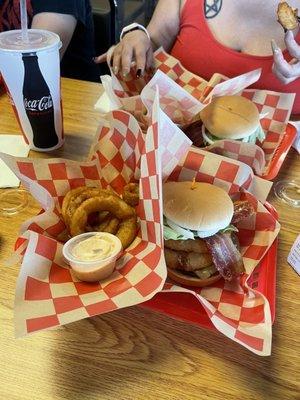 The cowboy burger  was delicious and great portion. And them onion rings WOW