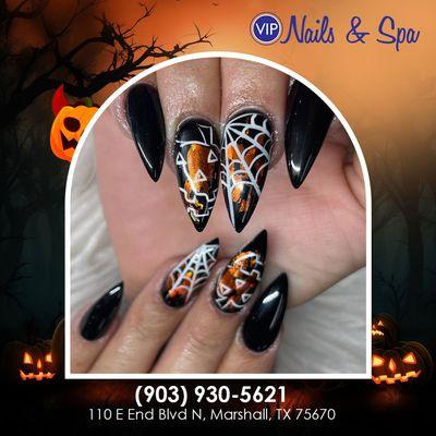 Elegance Meets Spookiness: Experience Exceptional Halloween Nail Art at our Luxurious Salon!