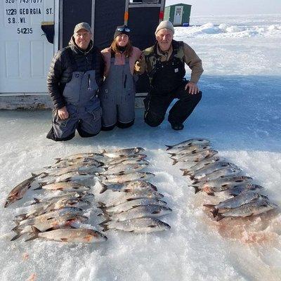 Ice Fishing for White Fish on the Bay - shacks for rent and fully guided trips