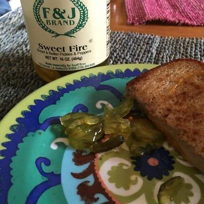 Sweet Fire bread and butter pickles and peppers (jalapeno).  So good on Grilled cheese, chicken sandwich, you name it!