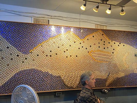 Beer bottle top fish mural