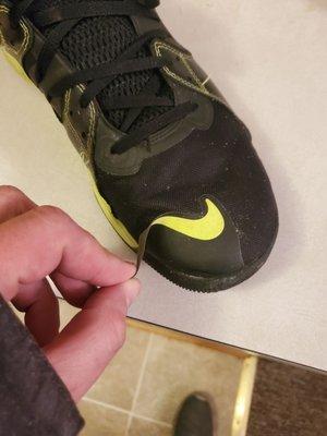 The symbol coming off of shoes less then 2 weeks old