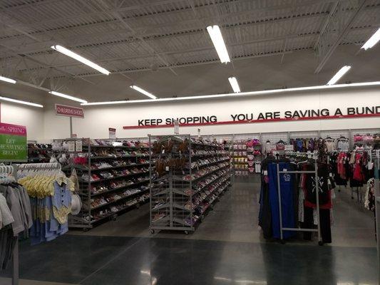 Shoe department located opposite children's.