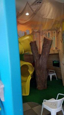 Small little play room. Climb on up and go through the slide!!