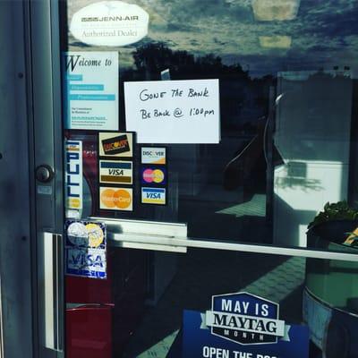 Sign on door on 10/27/2015.  "Gone The Bank Back @ 1:00pm"