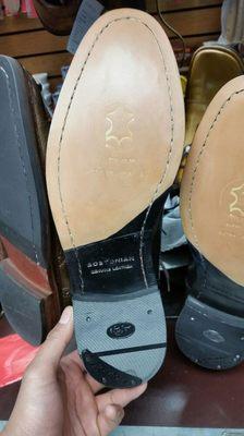 Leather half sole and rubber heel with rubber heel plates