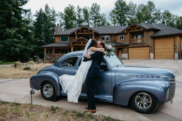 Portraits next to your Vintage wedding getaway car