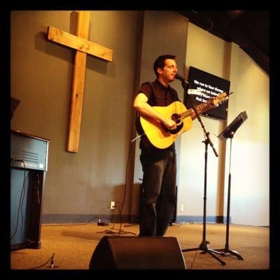 Pastor Darren leading worship.