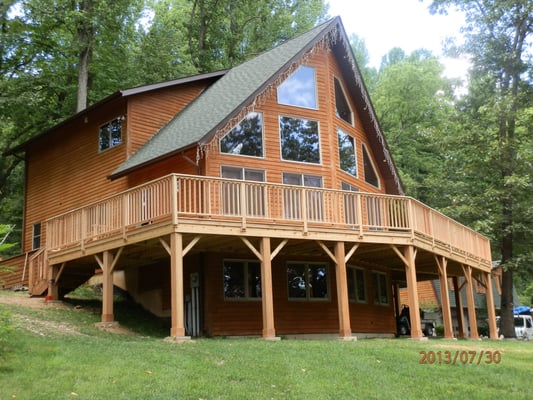 Cedar wrap around deck. Including curved staircase and low voltage lighting.