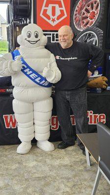 Lenny from WLIP Radio with Michelin Man at Kenosha Grand Opening