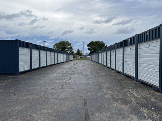 8'x10'x40' Modified Shipping Containers, Added Venting and Rollup Garage Doors.