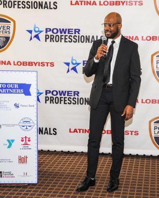 Joam Alisme accepted Schneps Media's Power Lawyer Award.