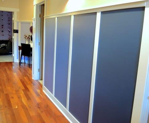 Hallway to a tweens room. Each panel transitions from plum to lavender.