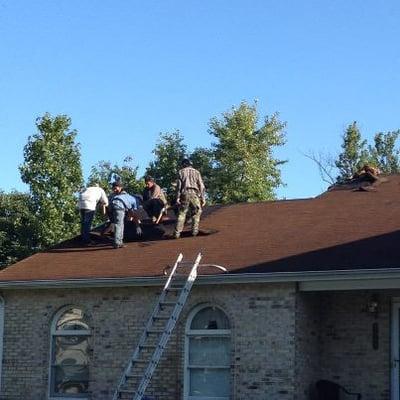 The Davis crew beginning our roof repair.