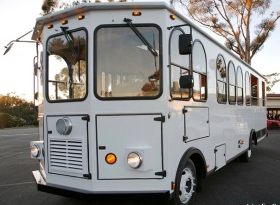 White trolley exterior - The 312 Limo https://www.the312limo.com/limo-bus/