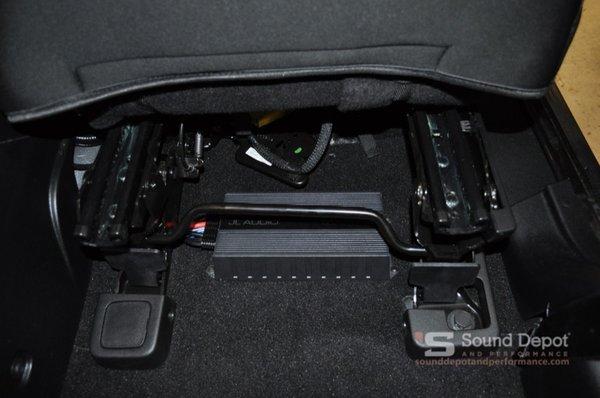 JL Audio MX Amp neatly installed under the drivers seat