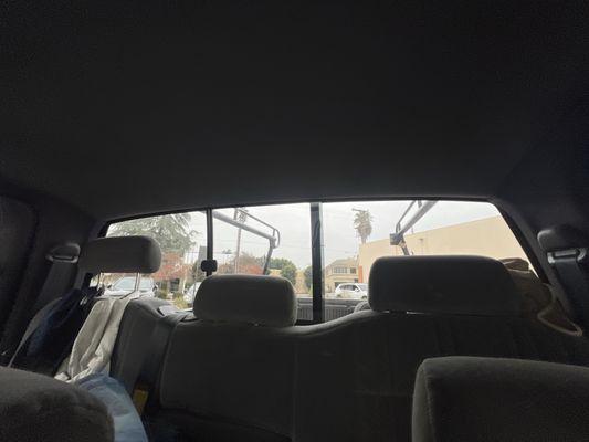 Repaired rear cab windshield with sliding door