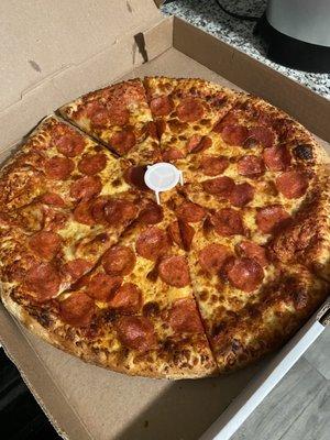 Large Pepperoni pizza. Still delicious 20 minutes after pick-up.