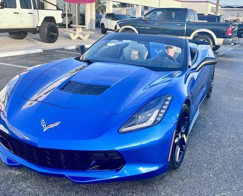 My daughter and I in our new 2014 Corvette Z51 stingray in Laguna Blue