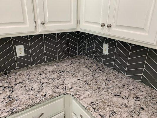 Cambria Quartz countertops with Chevron wall tile