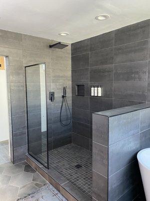 Full master shower remodel, including floor to ceiling tile in the entire bath.