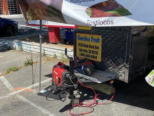 Signage on the cart. Real small and not visible from the street. It is located next to Zamora's Omlette House.