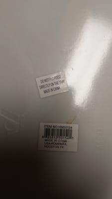 label on back of parrillada tray: 'DO NOT PUT FOOD DIRECTLY ON THE TRAY. MADE IN CHINA'