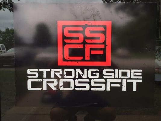 Strong side CrossFit logo Louisville KY on their door