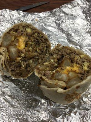 Delicious breakfast burrito sausage, potato ,egg and cheese!