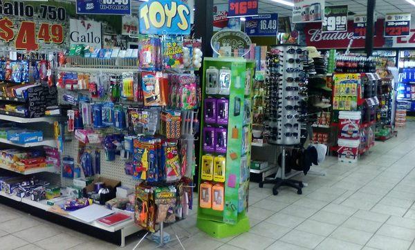 Snacks, beer & lotto too, EZ Grocery's got sundries for you.