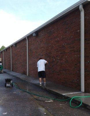 Pressure cleaning this local store after a remodel to make it look "new" inside and out