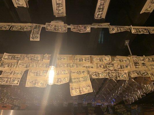 An array of signed dollar bills