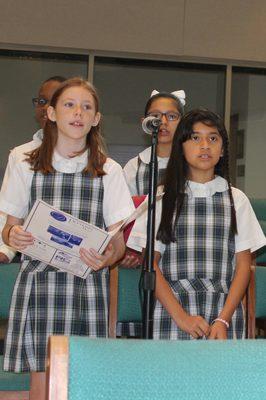 Students participate in the Liturgy service by either being in the choir, as altar servers, lectors, gift bearers or cantors.